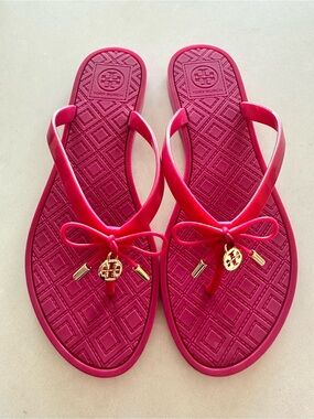 Tory Burch Bright Pink Bow Jelly Sandals with Gold Logo Charm